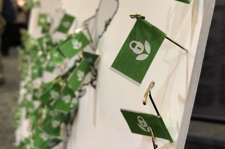 Small green flags with the Data Refuge logo pinned to a map.